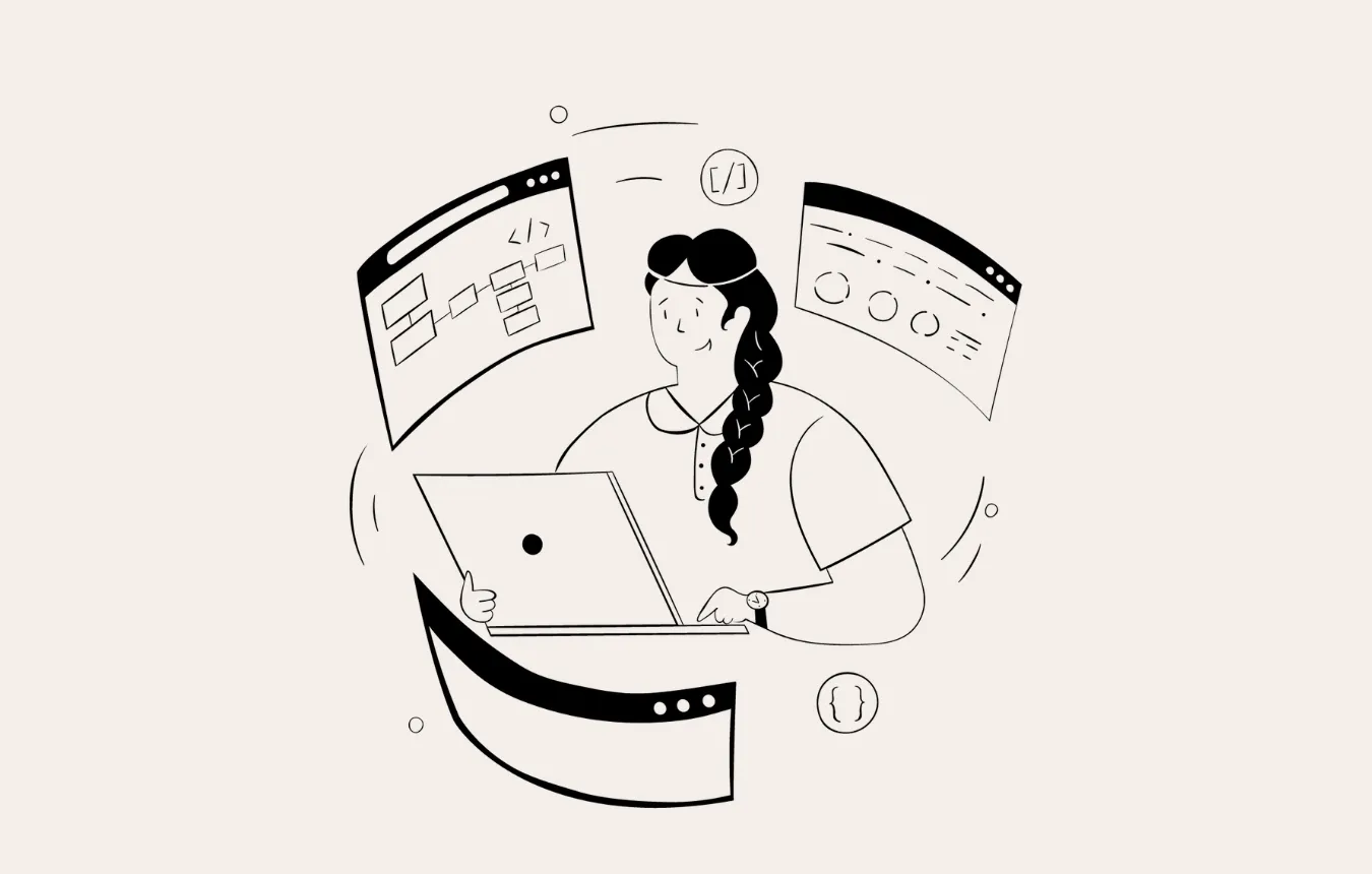A female designer is surrounded by digital screens as she codes